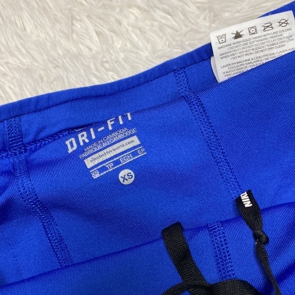 Nike red & blue running shorts with skirt overlay - Picture 6 of 7